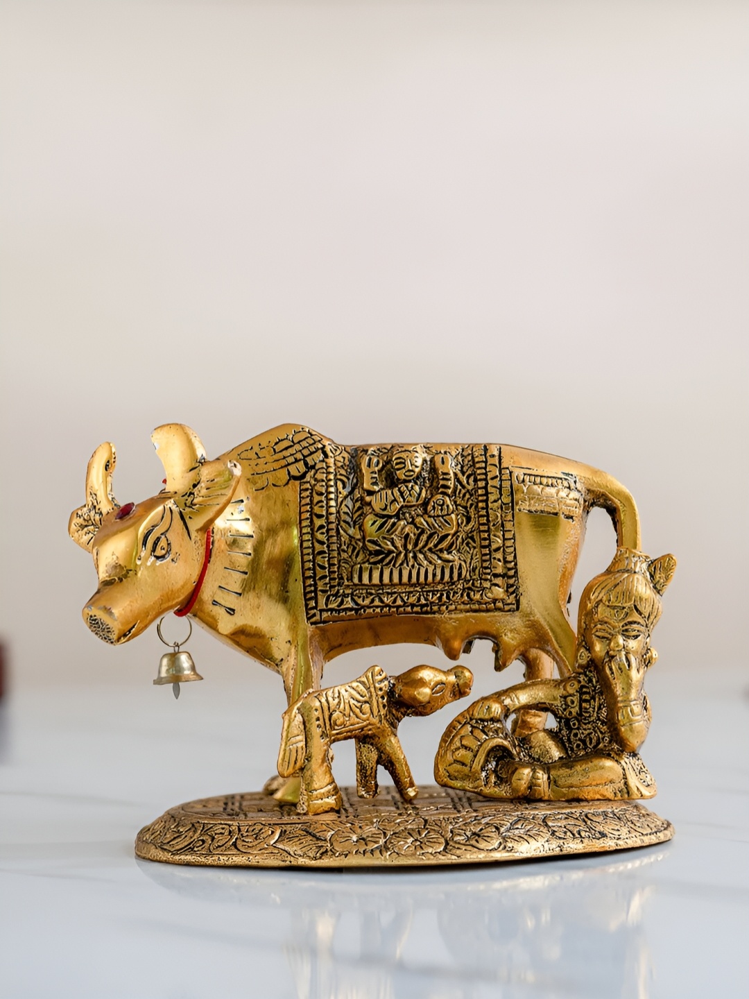 

DecorTwist Beige Religious Figurine Showpiece