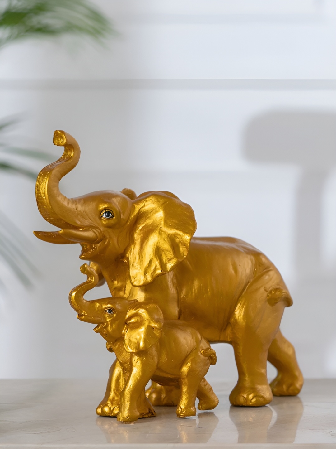 

DecorTwist Beige Figurine Showpiece