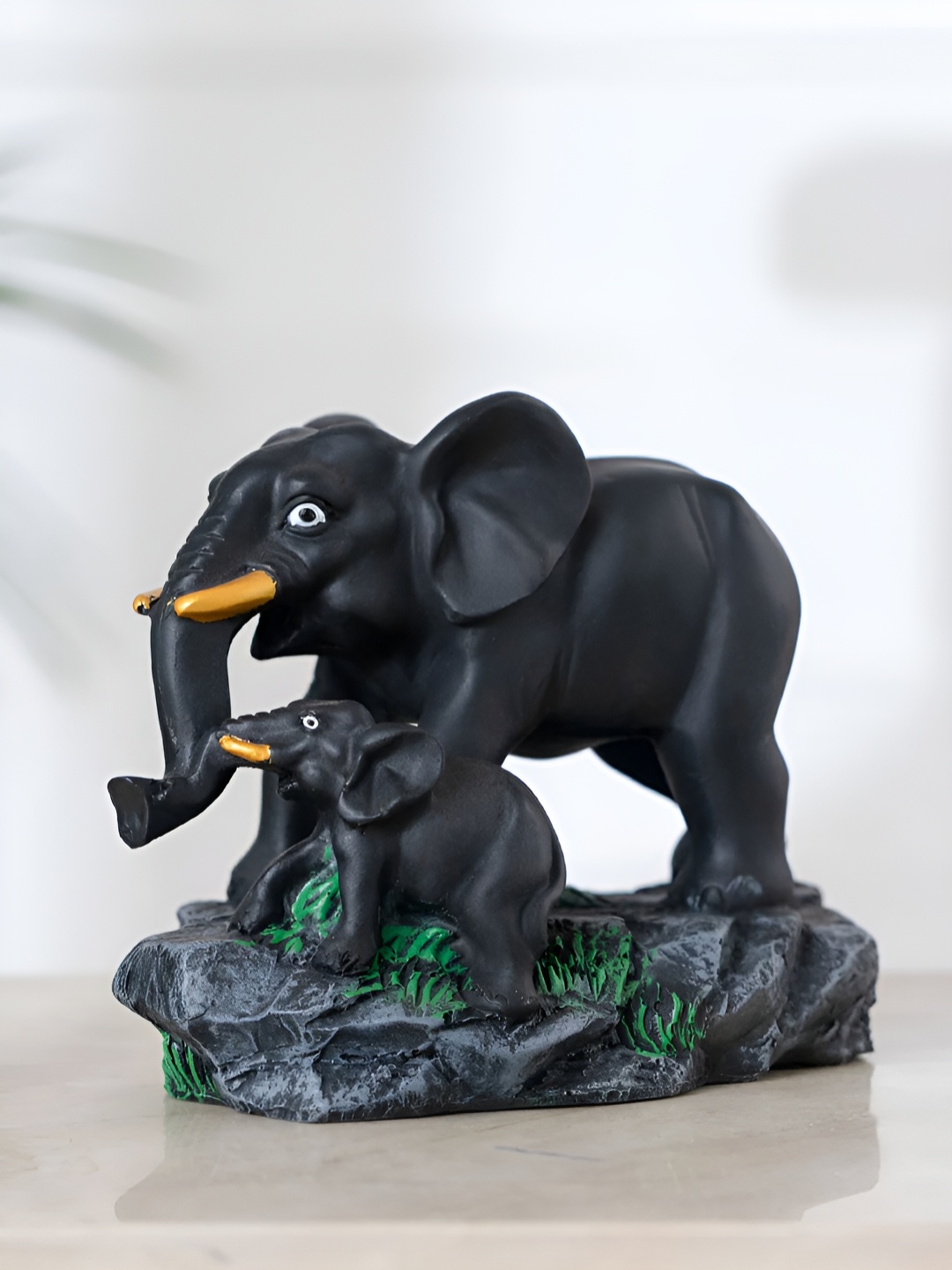 

DecorTwist Black Figurine Showpiece