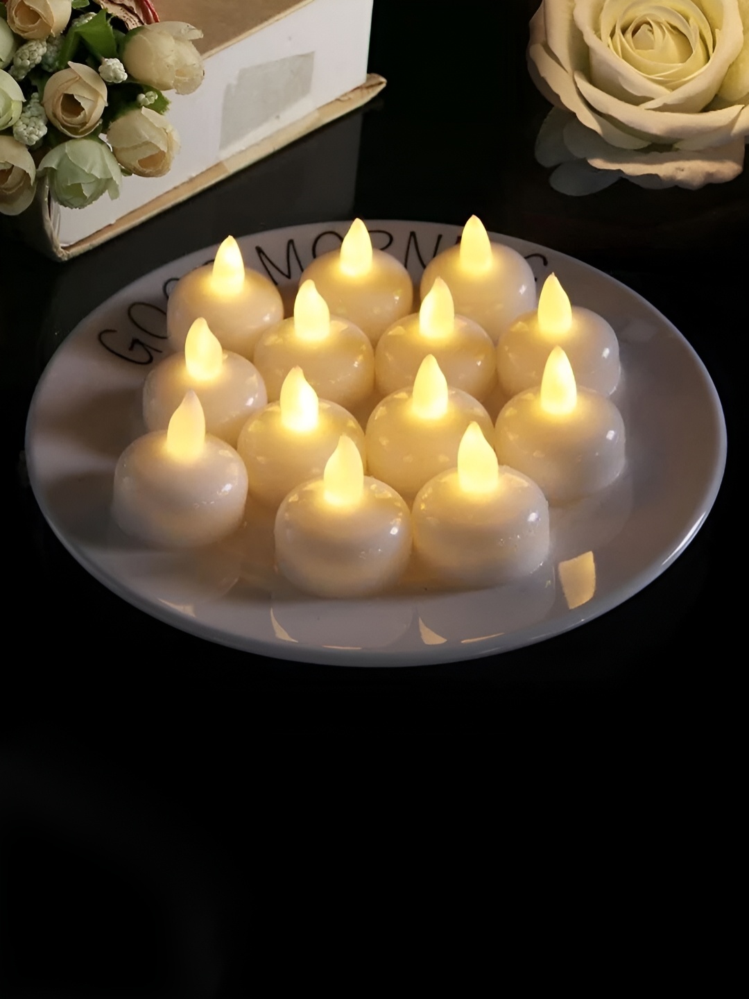 

DecorTwist 24 Pcs White Battery Led Tealight Electric Candle