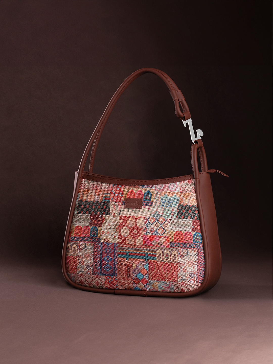 

ZOUK Kutch Gamthi Printed Sleek Handheld Bag, Tan