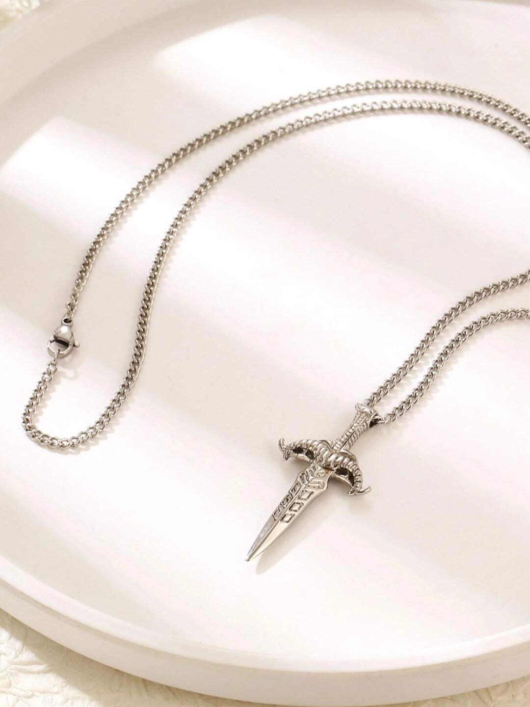 

VAGHBHATT Silver-Plated Sword-Charm Pendant With Chain