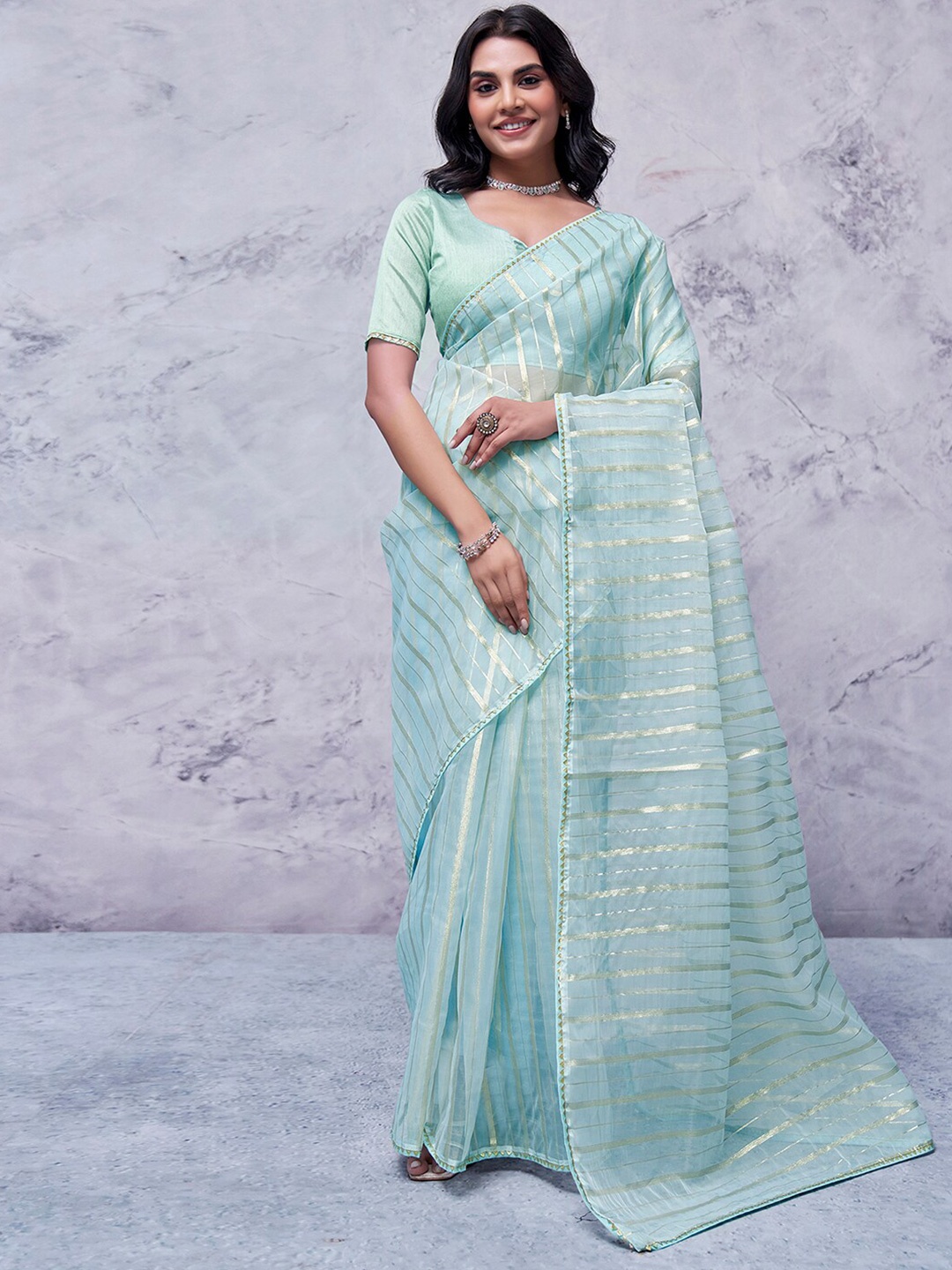 

KALINI Striped Zari Organza Leheriya Saree, Turquoise blue