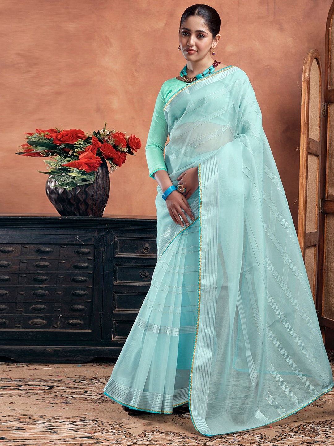 

KALINI Striped Zari Organza Saree, Turquoise blue