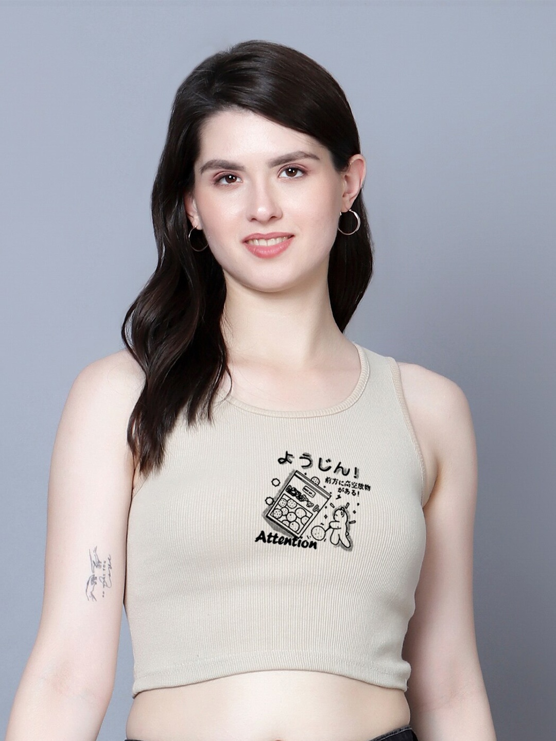 

Fashion And Youth Graphic Printed Round Neck Sleeveless Cotton Crop Top, Beige