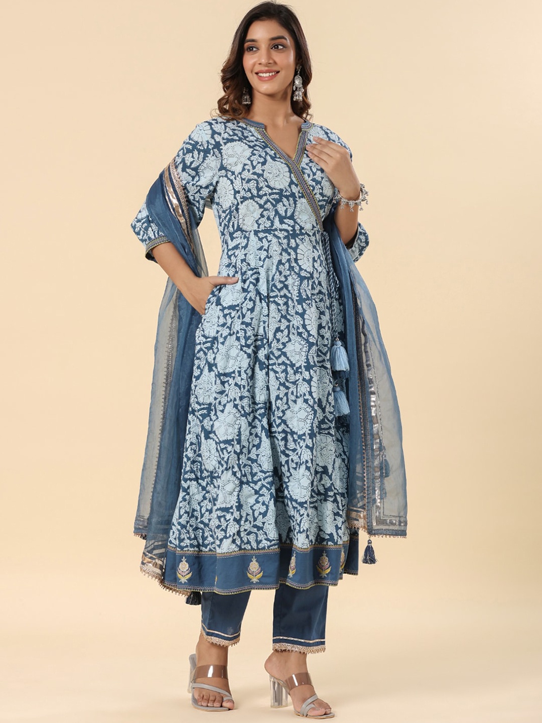 

SAVI Women Floral Printed Angrakha Thread Work Pure Cotton Kurta with Trousers & With Dupatta, Blue
