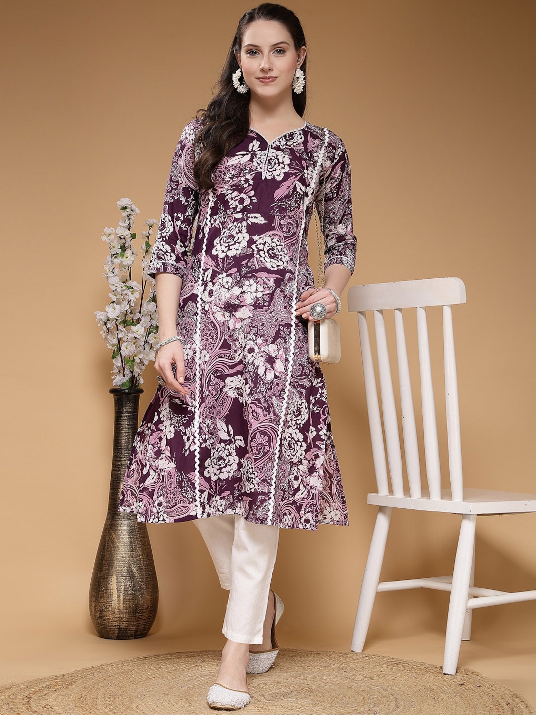

Indibelle Floral Printed Flared Sleeves Thread Work Cotton A-Line Kurta, Purple