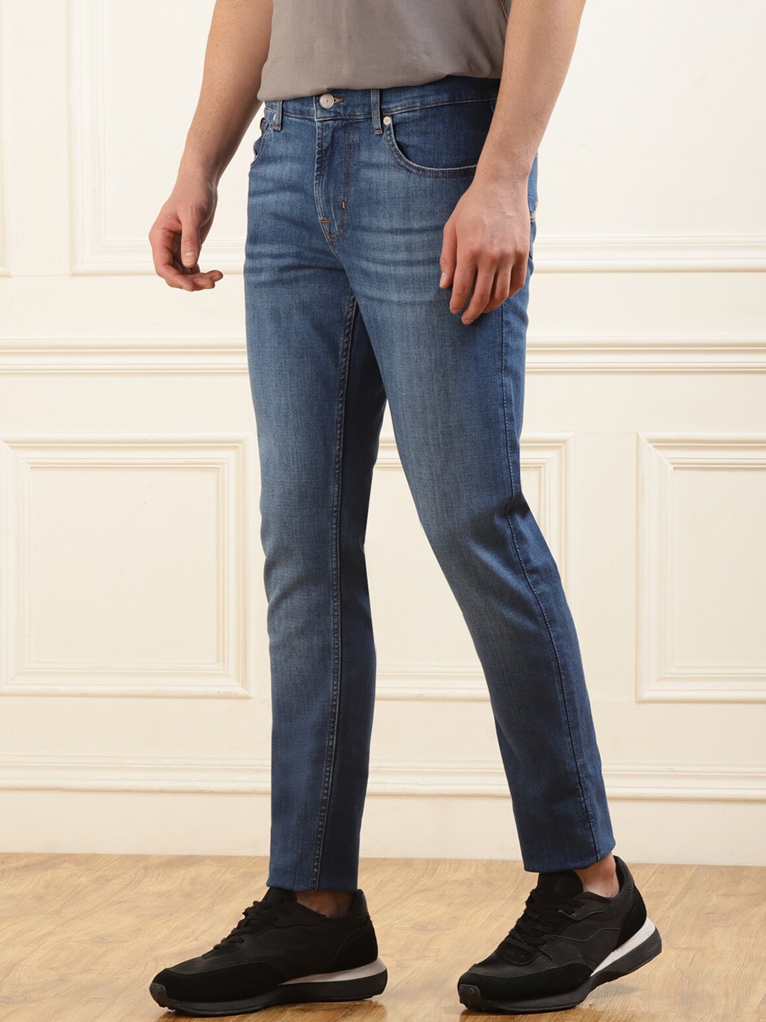 

7 For All Mankind Men Tapered Slim Fit Mid-Rise Light Fade Clean Look Stretchable Jeans, Blue