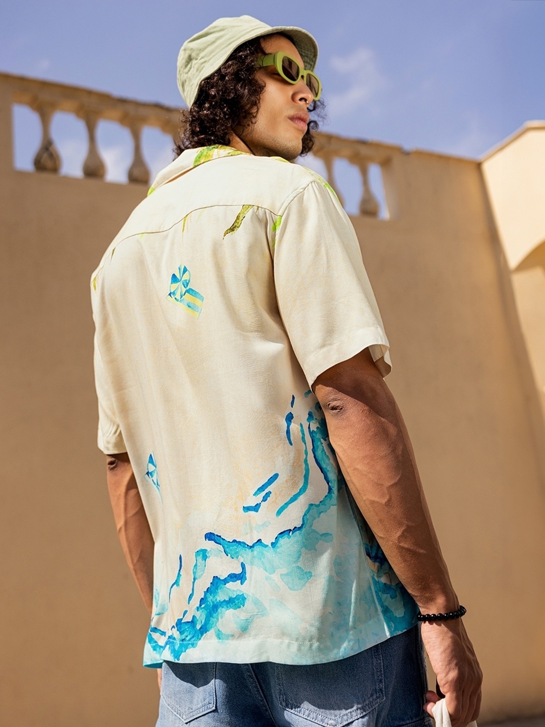 

Bewakoof Beige Abstract Printed Cuban Collar Oversized Shirt