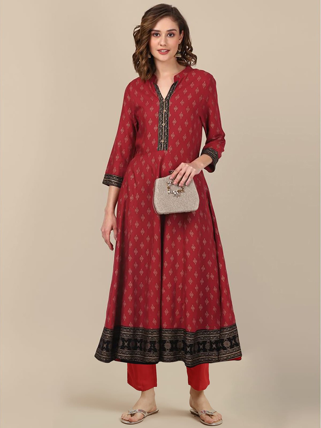 

Rangita Women Floral Regular Kurta with Trousers, Maroon