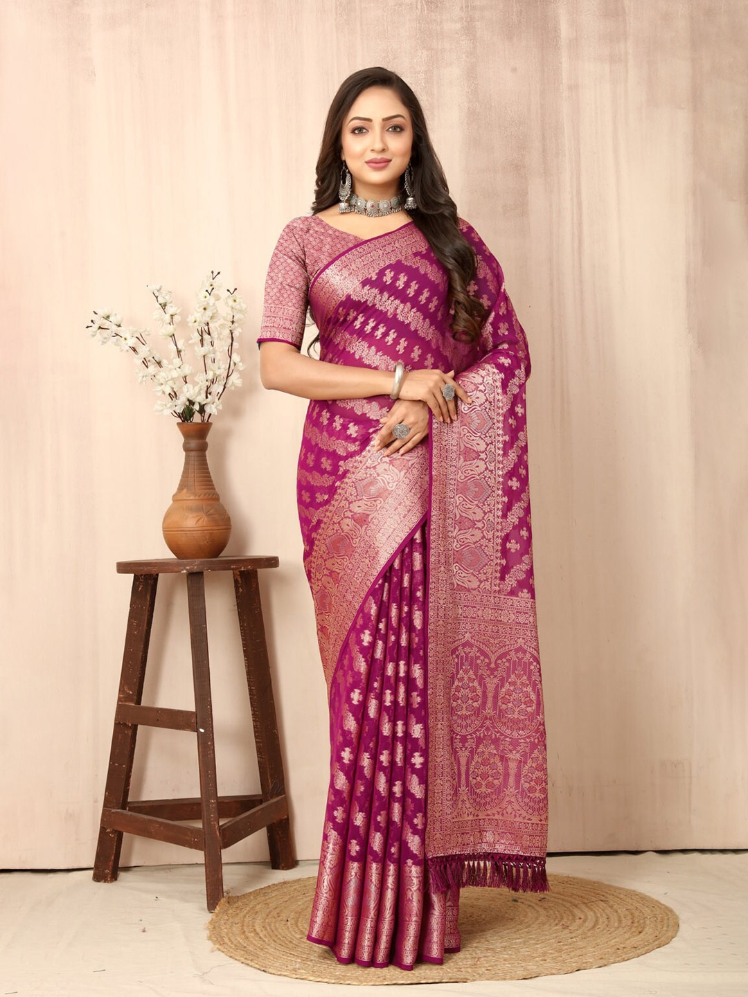 

nirja Fab Woven Design Zari Pure Georgette Kanjeevaram Saree, Magenta