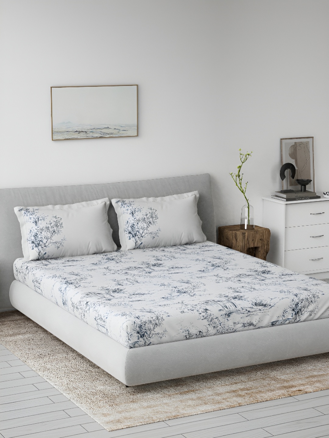 

DDecor Blue & White Floral 144 TC King Bedsheet with 2 Pillow Covers