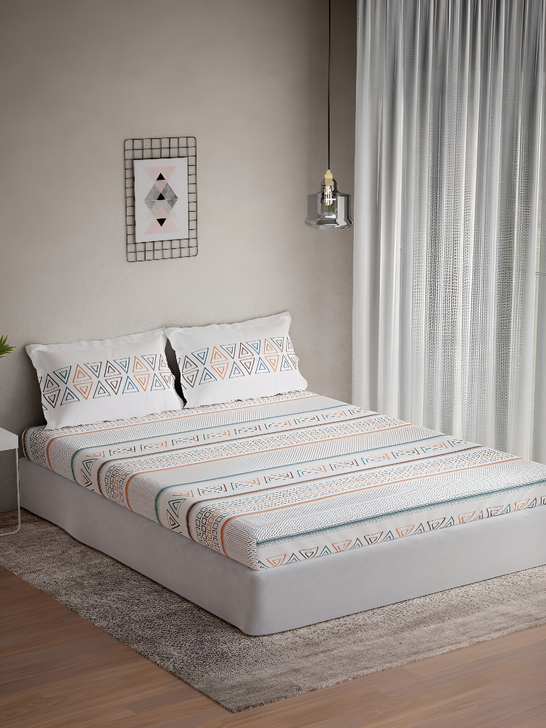 

DDecor Orange & White Geometric 144 TC Queen Bedsheet with 2 Pillow Covers