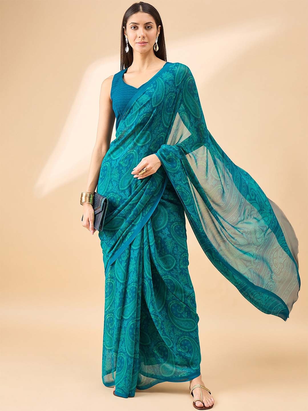 

Anouk Paisley Pure Georgette Saree With Blouse Piece, Turquoise blue