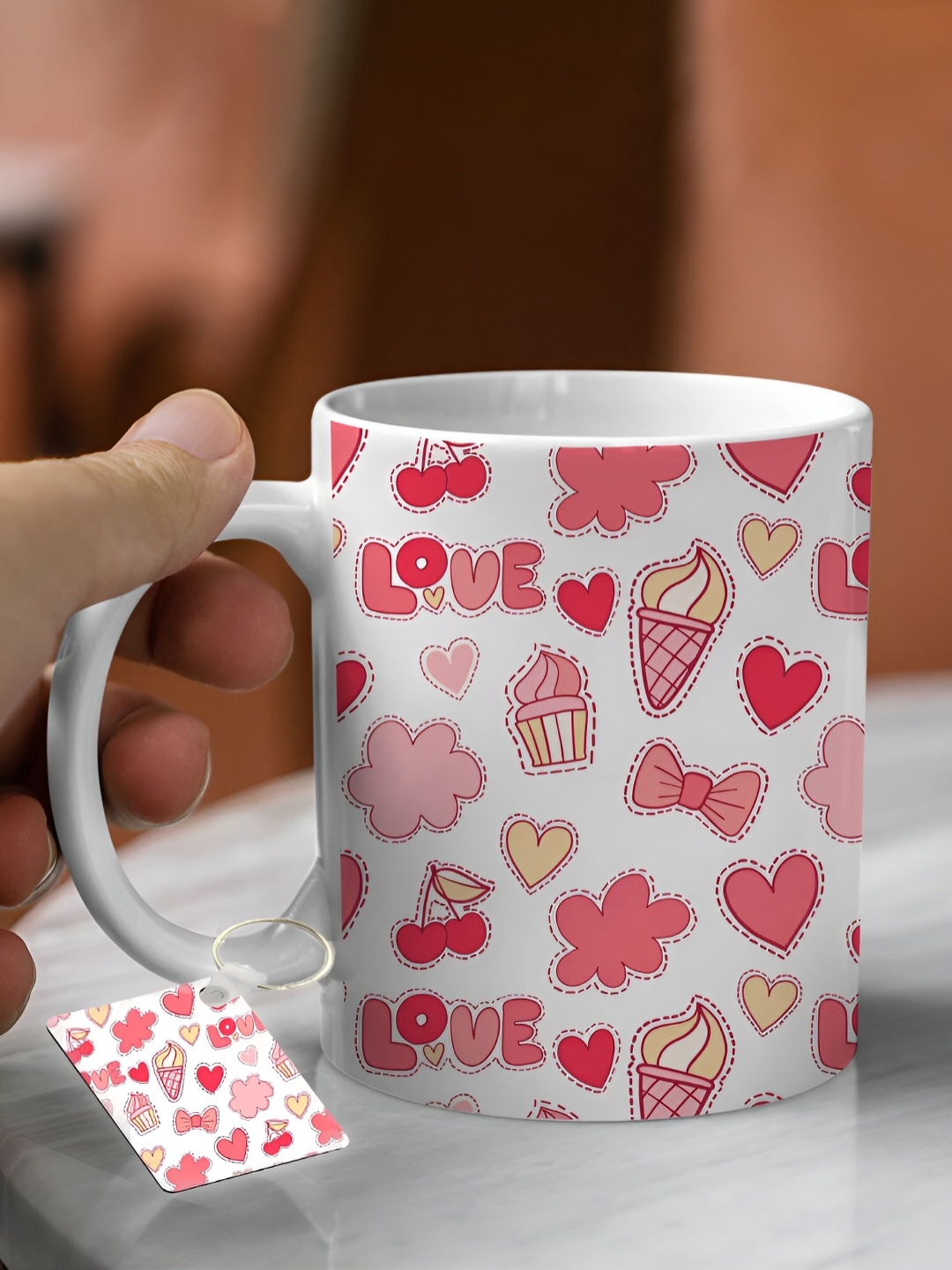 

DecorTwist White & Red Printed Ceramic Glossy Coffee Mug with Keychain 250 ml