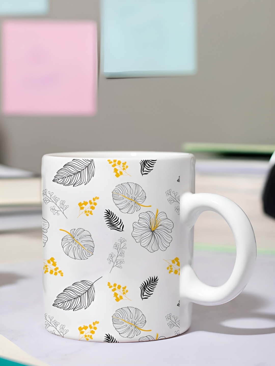 

DecorTwist White & Yellow Printed Ceramic Coffee Mug 250 ml