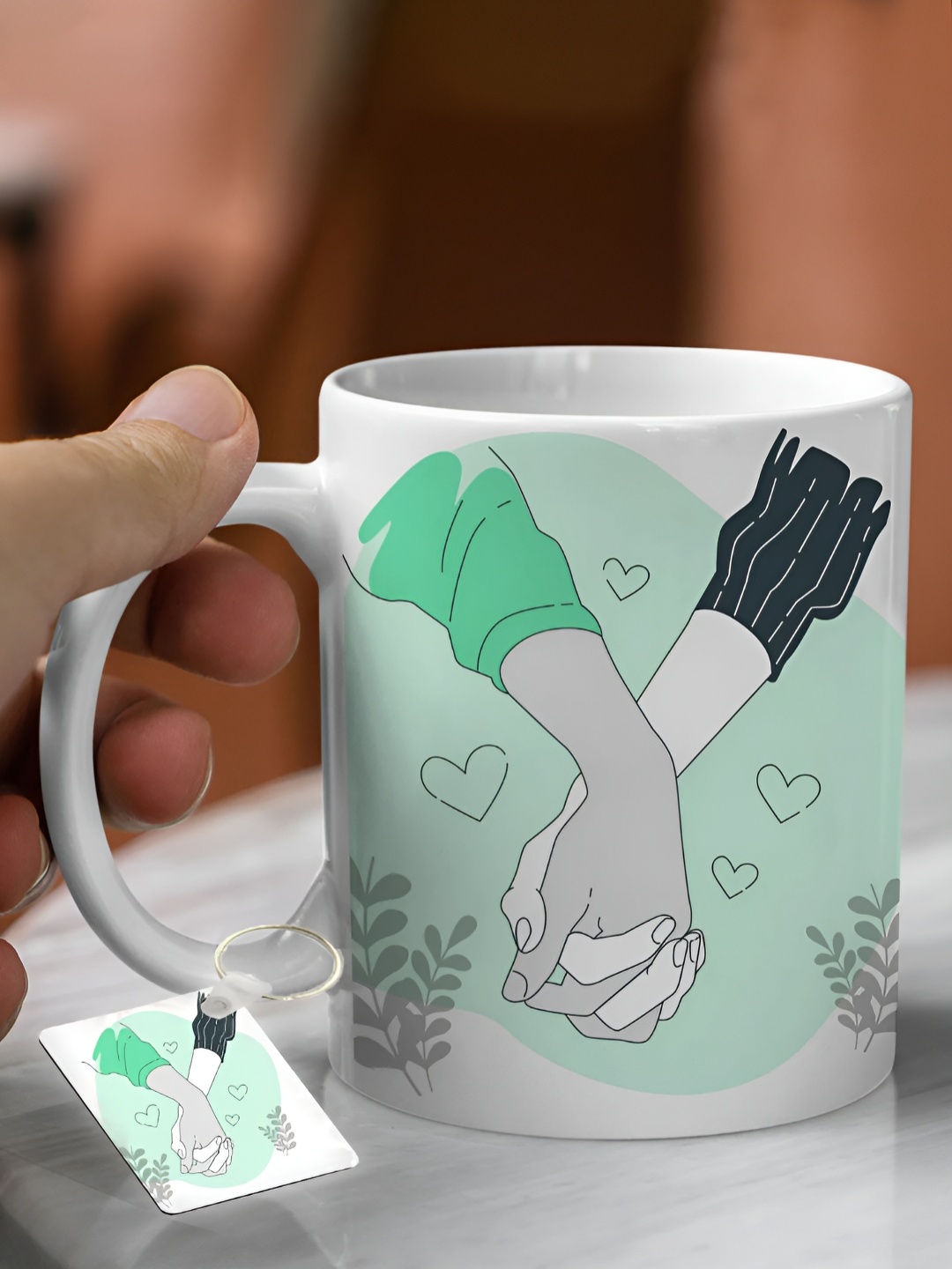 

DecorTwist White & Green Printed Ceramic Glossy Coffee Mug with Keychain 250 ml