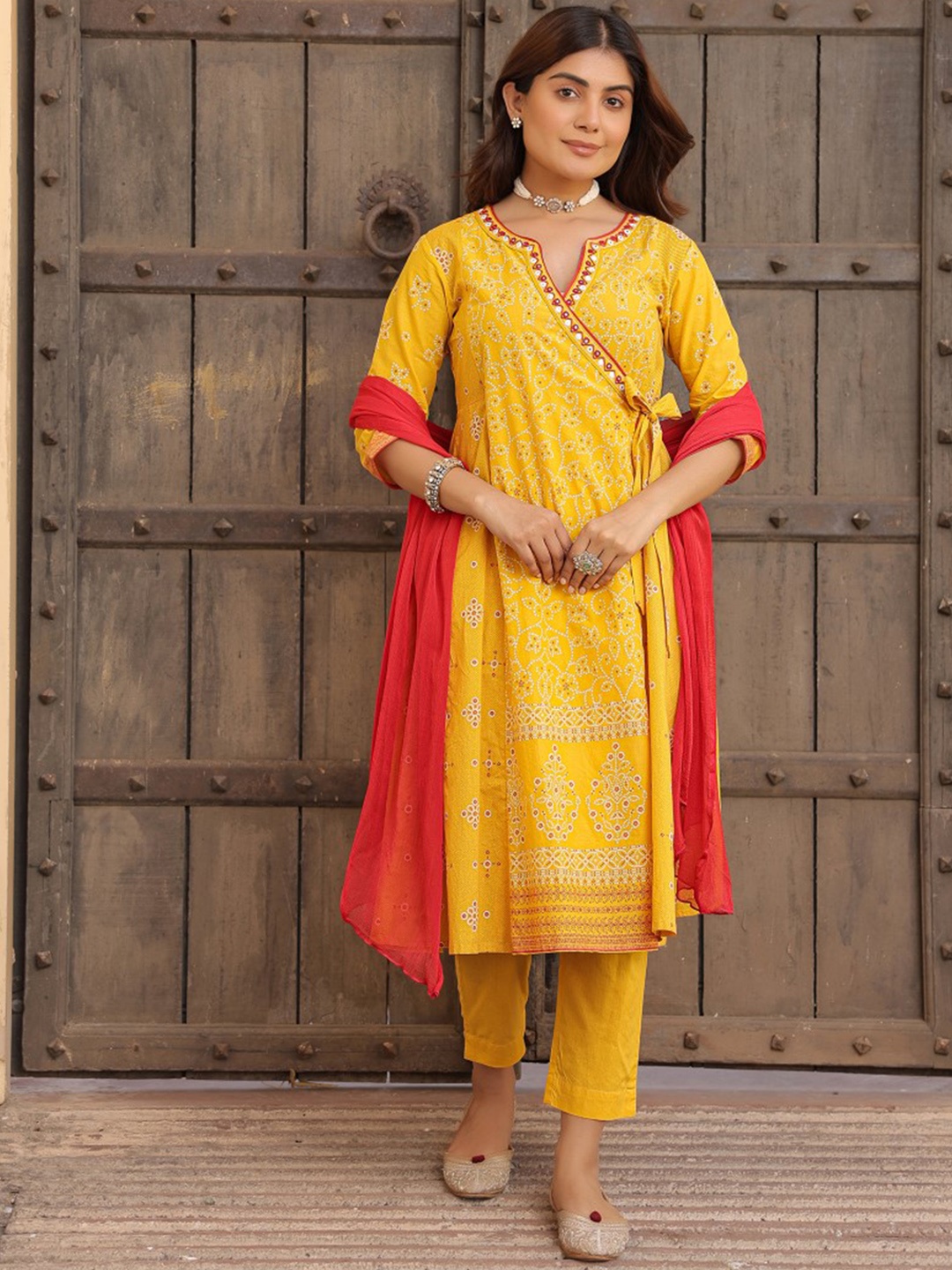 

Juniper Women Printed Angrakha Mirror Work Kurta with Trousers & With Dupatta, Mustard