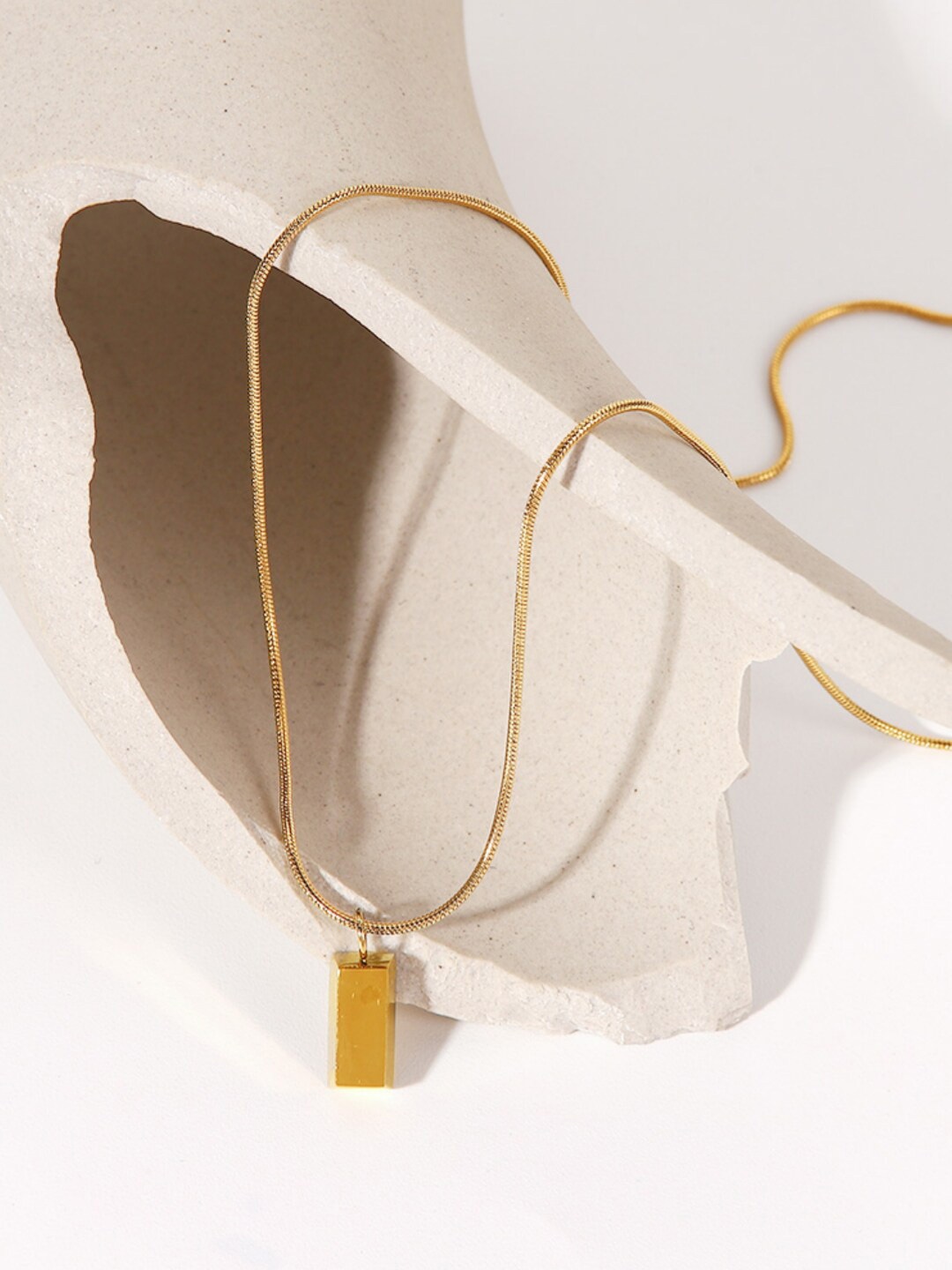 

Dorada Jewellery Gold-Plated Stainless Steel Geometric Shaped Pendant With Chains