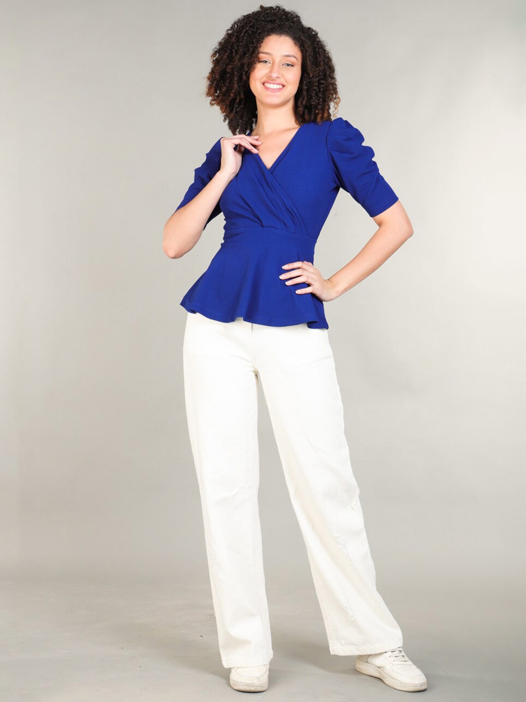 

The Roadster Lifestyle Co. Blue V-Neck Peplum Top