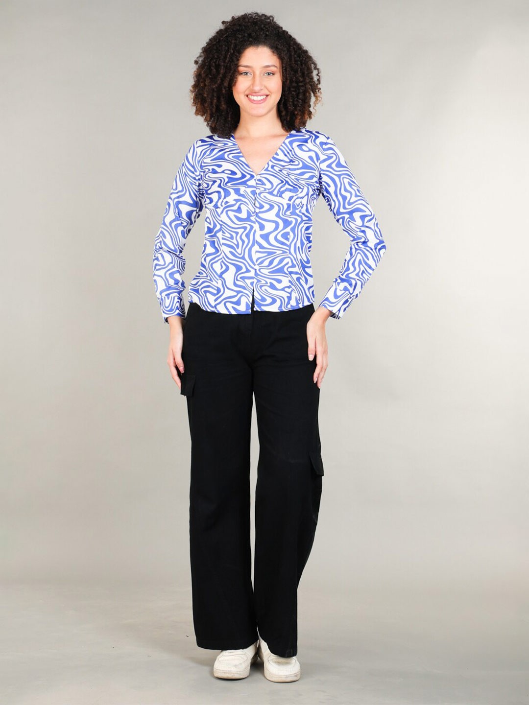 

The Roadster Lifestyle Co. Blue Abstract Printed V Neck Top