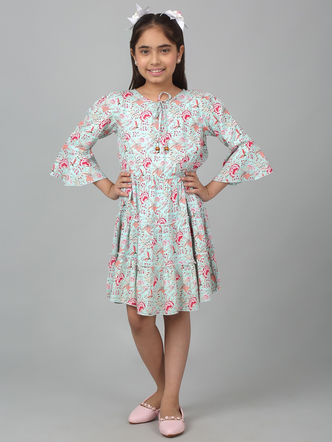 

Cantabil Girls Floral Printed Tie-Up Neck Bell Sleeves Fit & Flare Dress, Grey