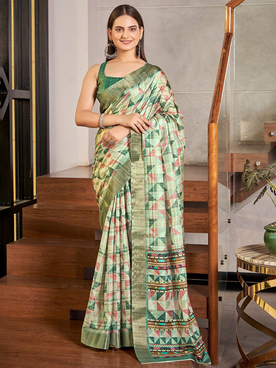

Vishudh Green Geometric Printed Zari Saree