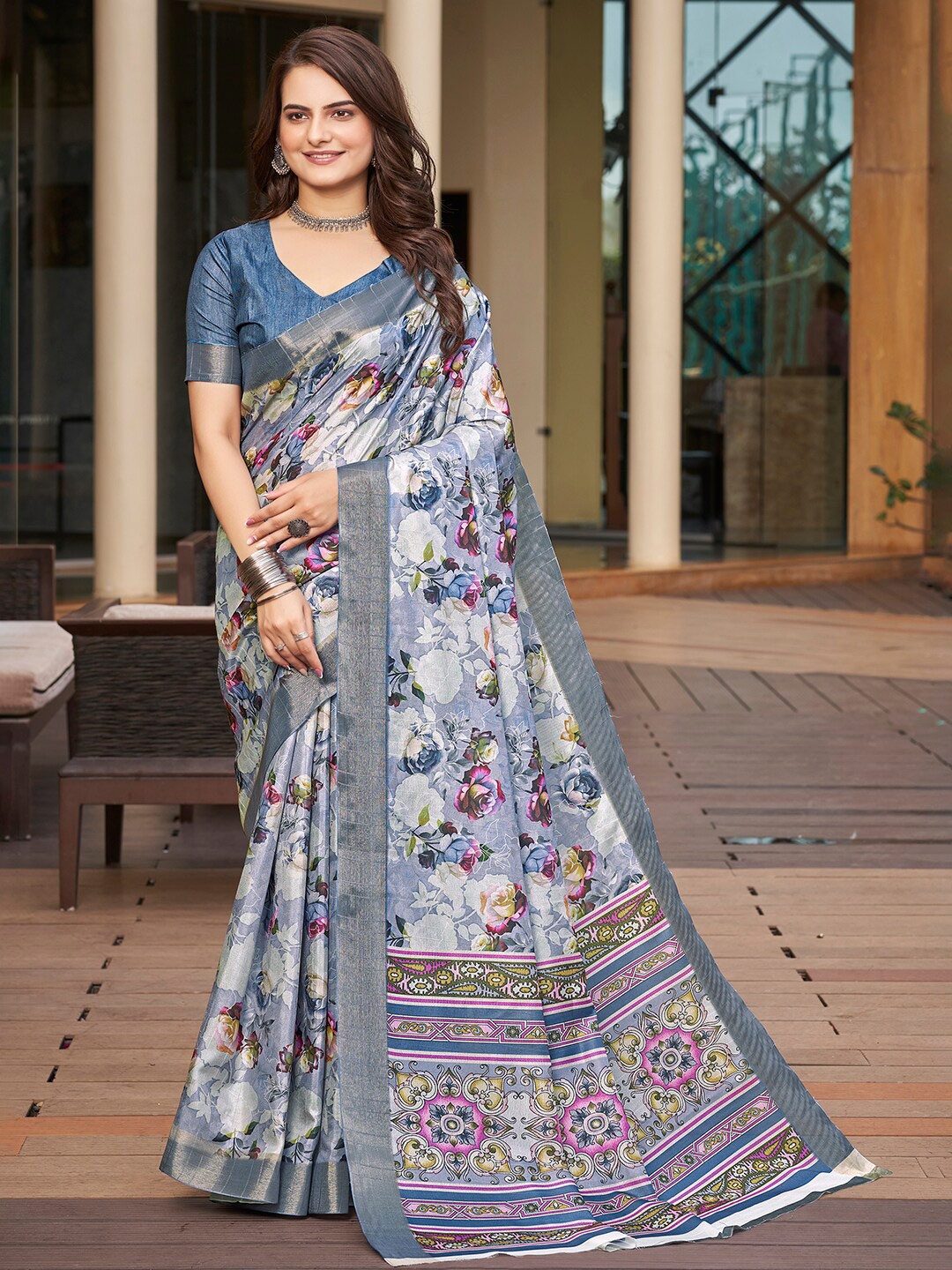 

Vishudh Blue Floral Printed Zari Saree