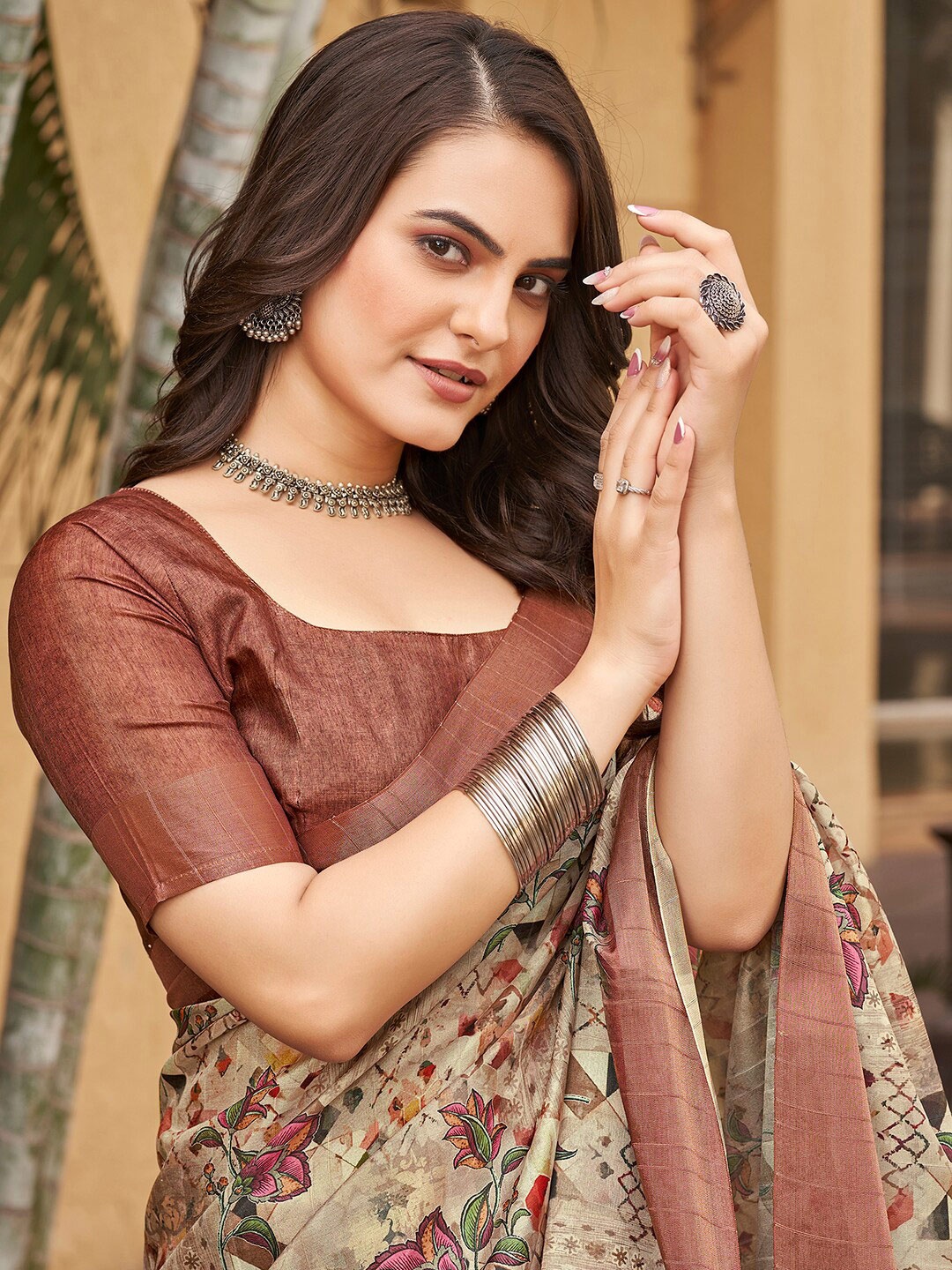 

Vishudh Brown Floral Printed Zari Saree