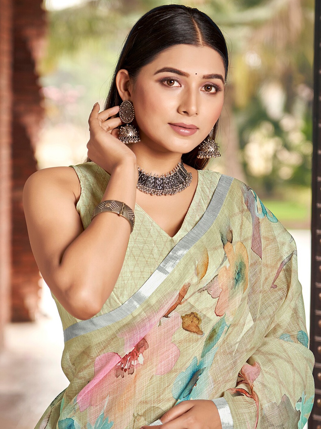 

Vishudh Green Floral Printed Zari Linen Silk Saree