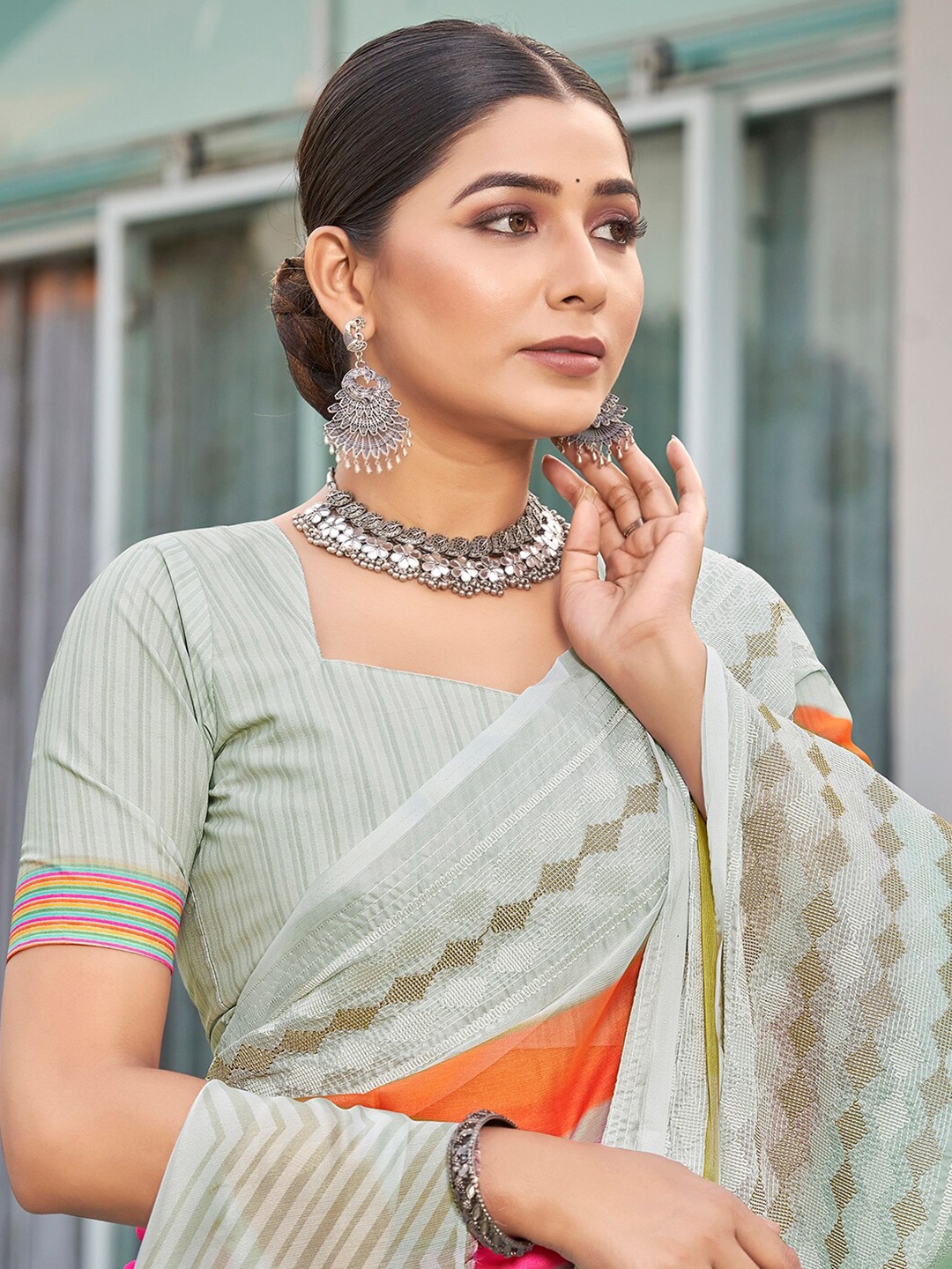 

Vishudh Grey & Orange Striped Embroidered Saree