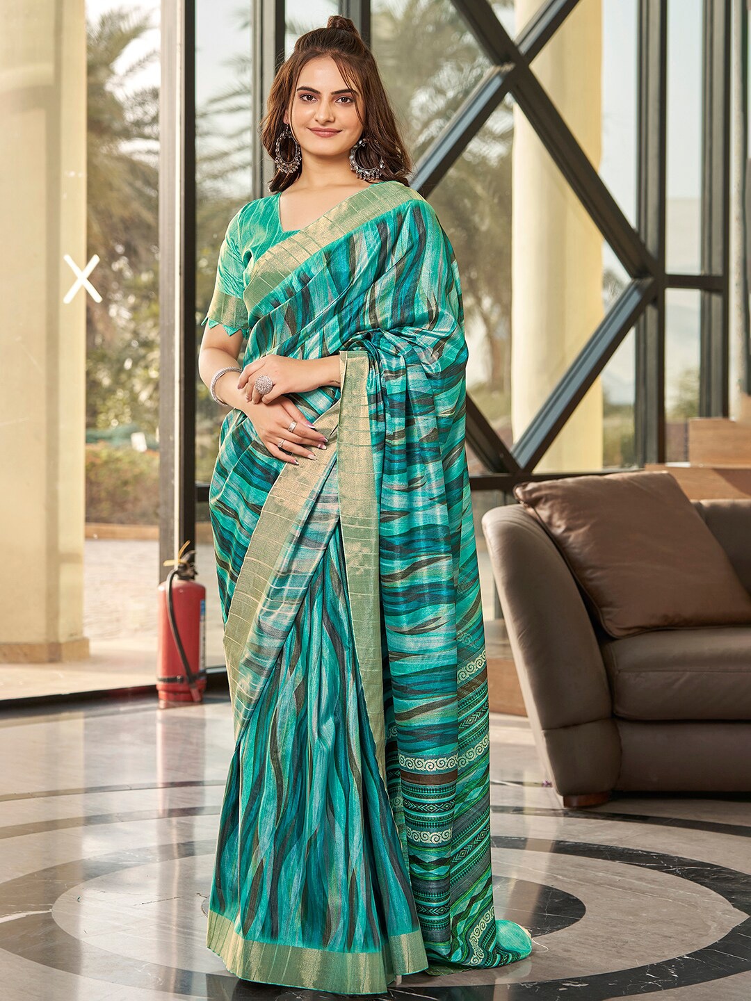 

Vishudh Blue Floral Printed Zari Saree