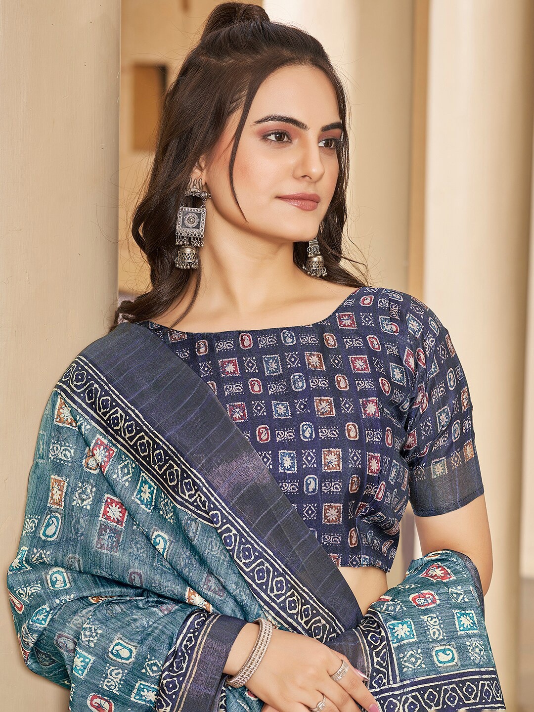 

Vishudh Blue Geometric Printed Zari Saree
