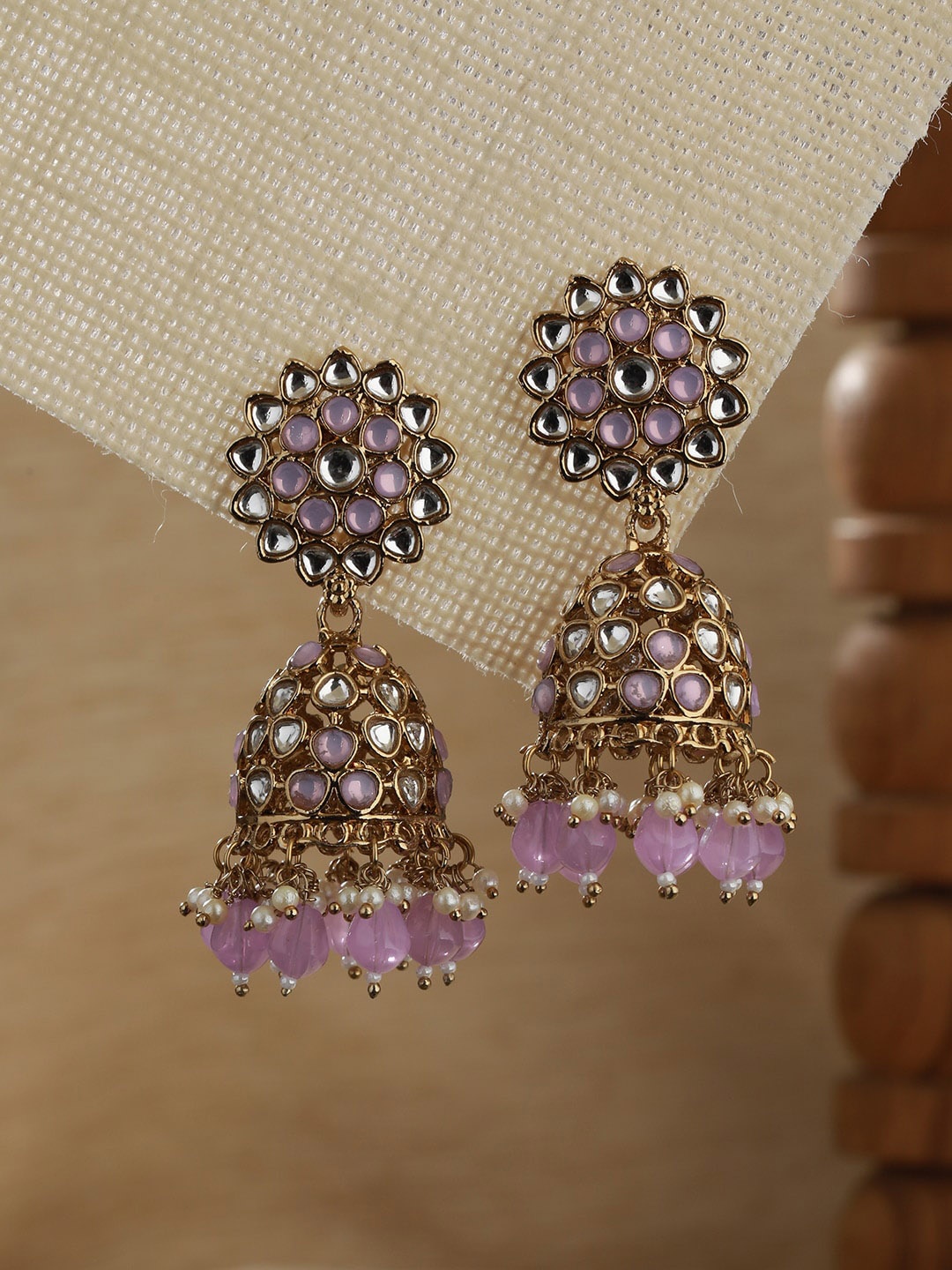 

Jazz and Sizzle Gold-Plated Dome Shaped Kundan Studded Jhumkas Earrings