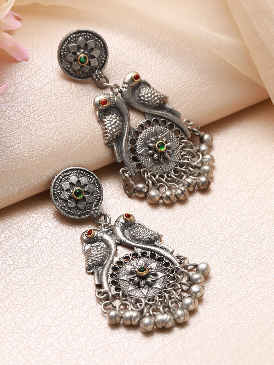 

Jazz and Sizzle Silver-Plated Peacock Shaped Oxidised Jhumkas