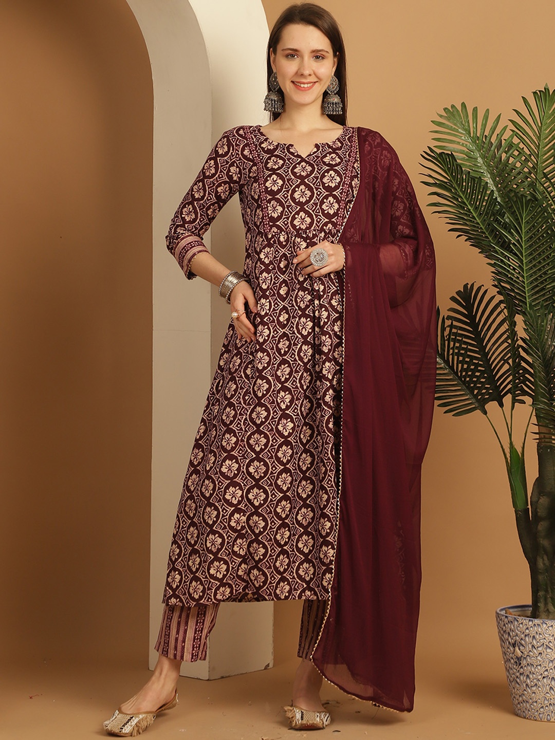 

Rajnandini Notch Neck Floral Printed Regular A-Line Kurta with Trousers & Dupatta, Maroon