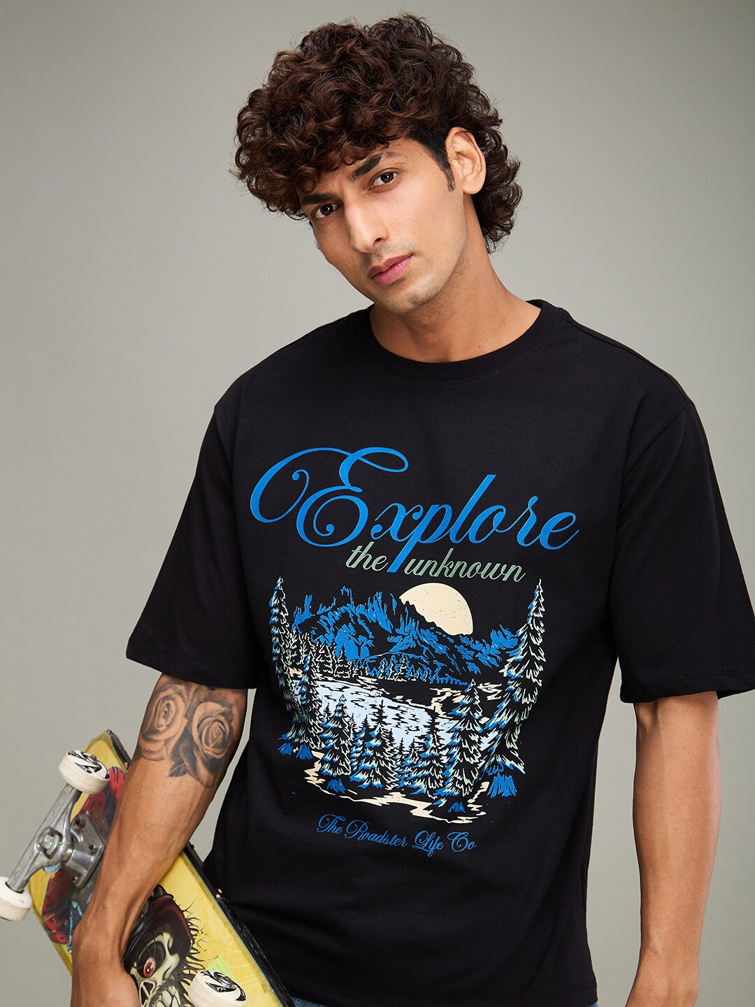 

The Roadster Lifestyle Co Black Graphic Printed Round Neck Cotton Oversized-Fit Tshirt
