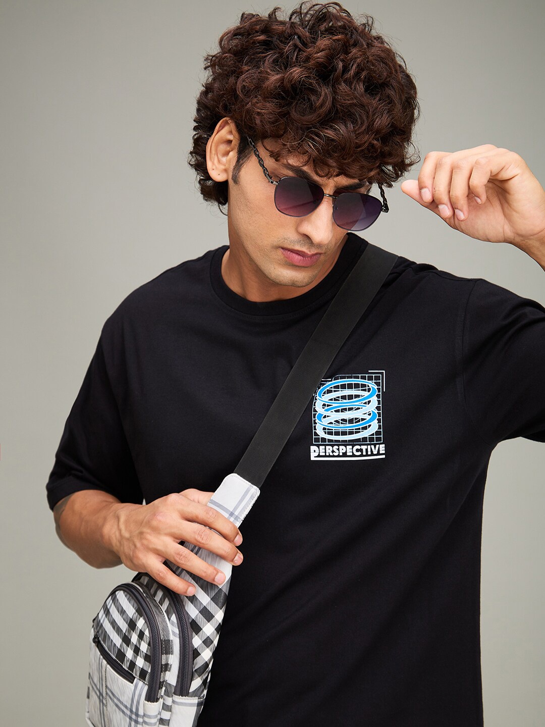 

The Roadster Lifestyle Co Black Printed Cotton Oversized Tshirt