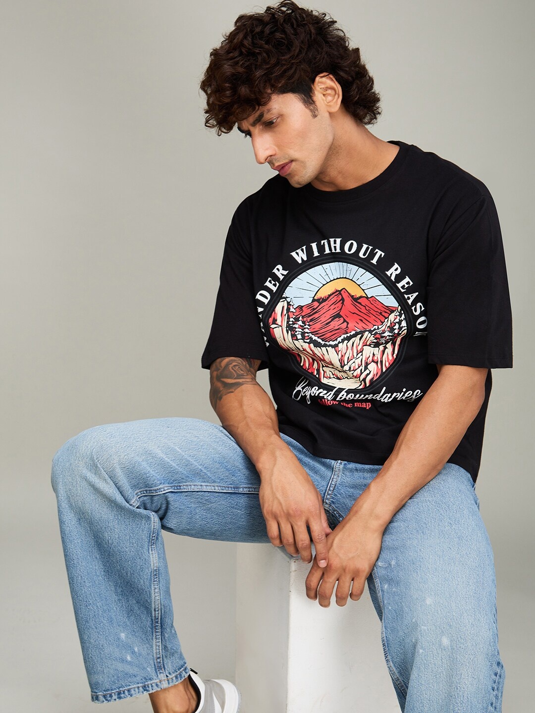 

The Roadster Lifestyle Co Black Printed Cotton Oversized Tshirt