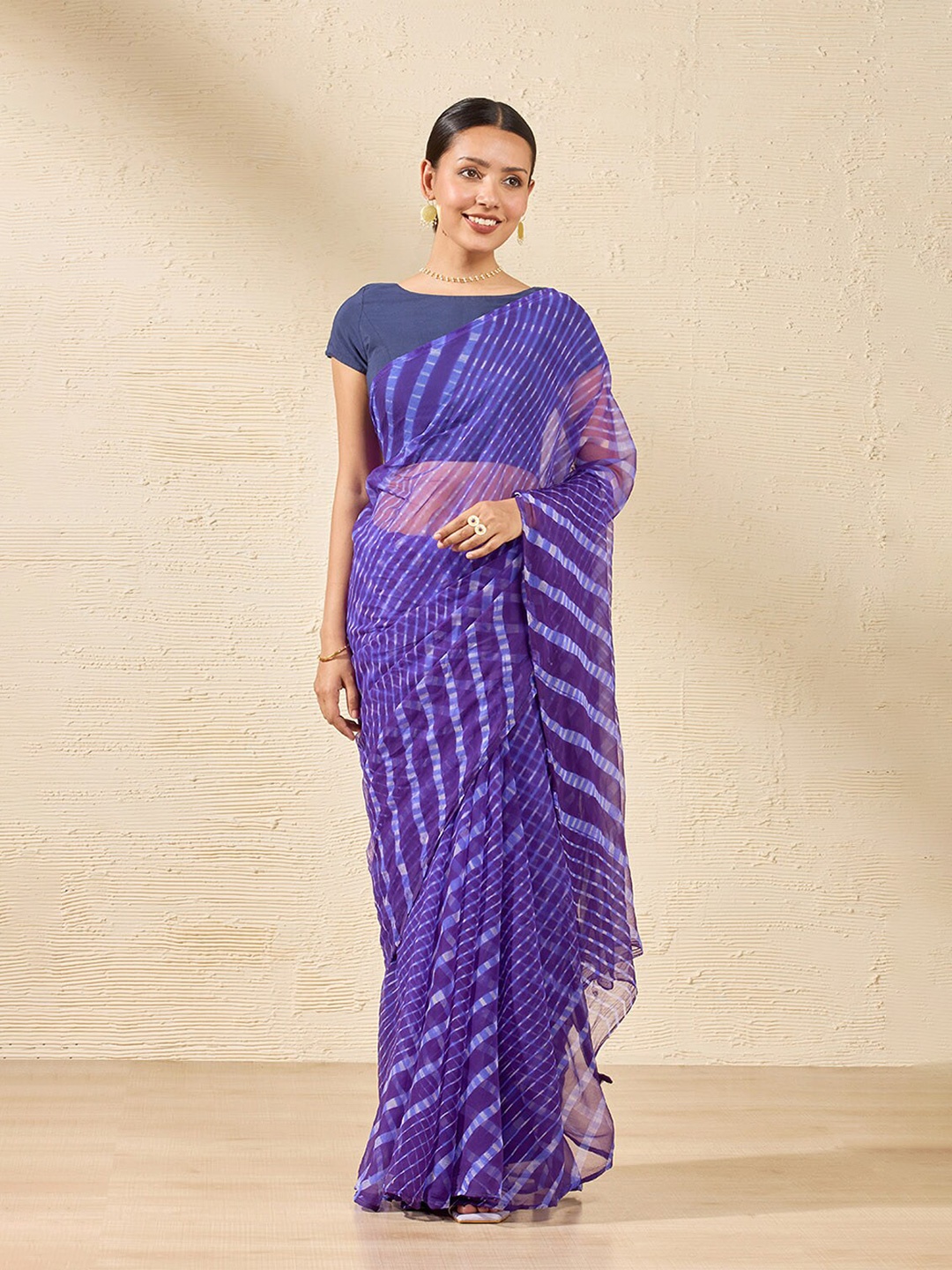 

Taneira Leheriya Pure Georgette Saree, Purple