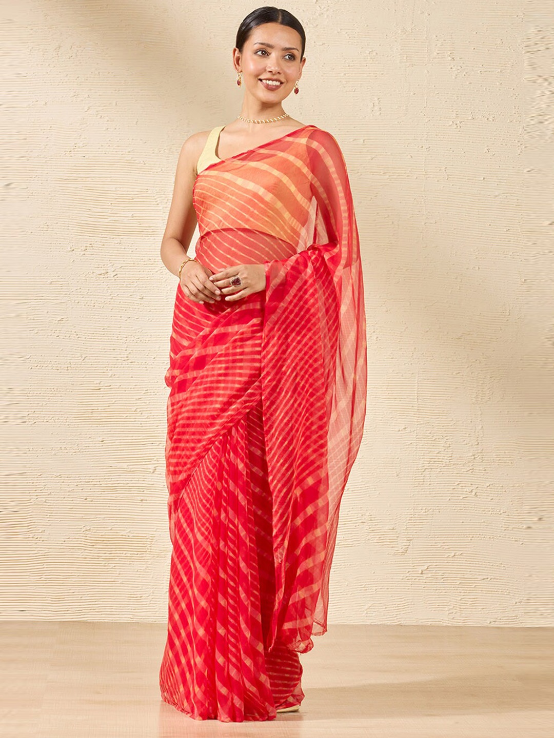 

Taneira Leheriya Pure Georgette Saree, Red