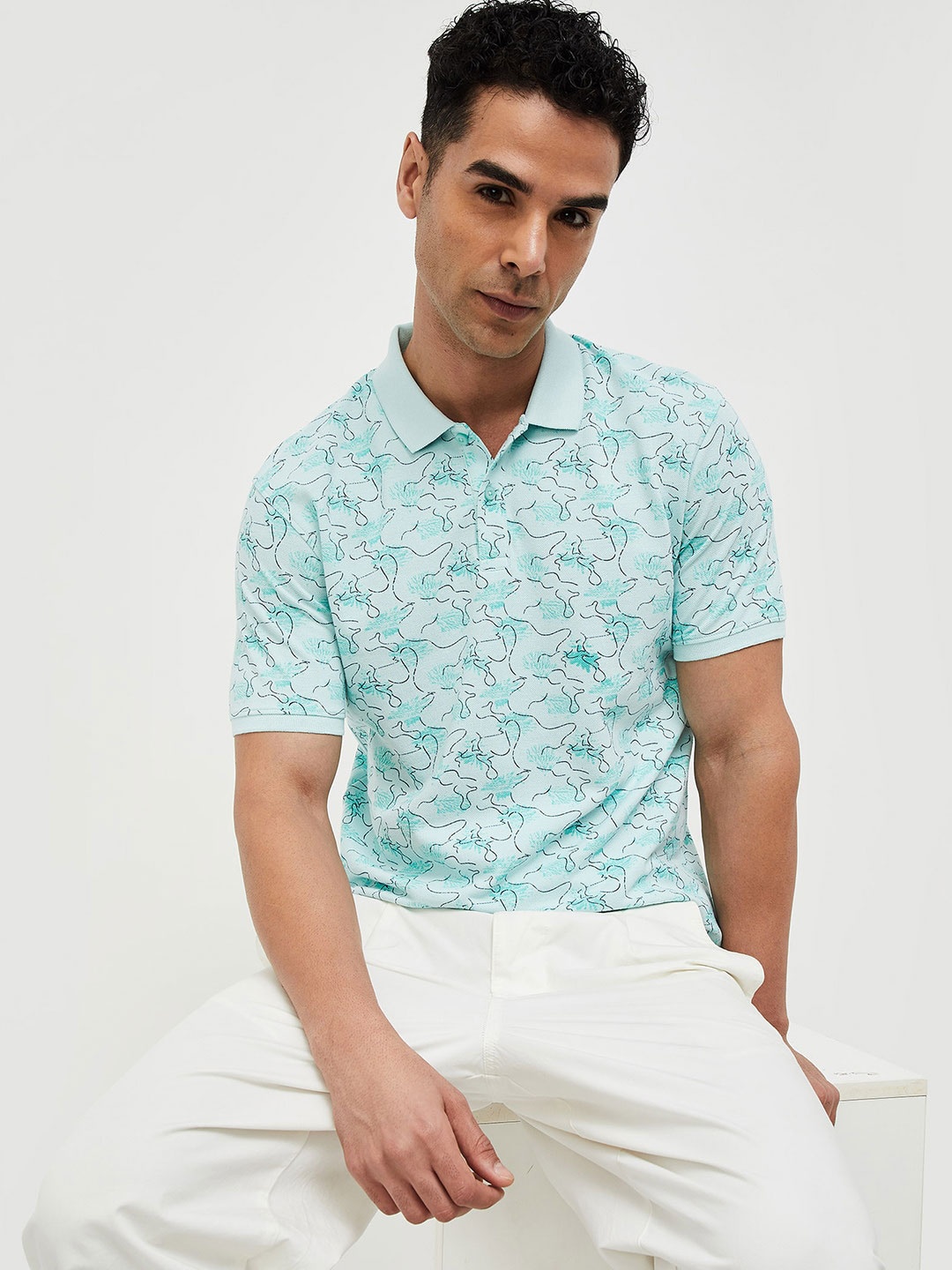 

CODE by Lifestyle Floral Printed Short Sleeves Polo Collar T-shirt, Turquoise blue