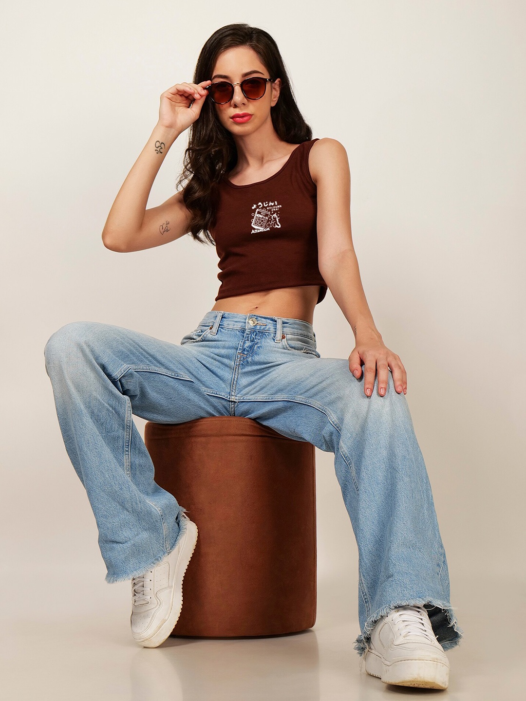 

Fashion And Youth Graphic Printed Sleeveless Fitted Crop Top, Coffee brown