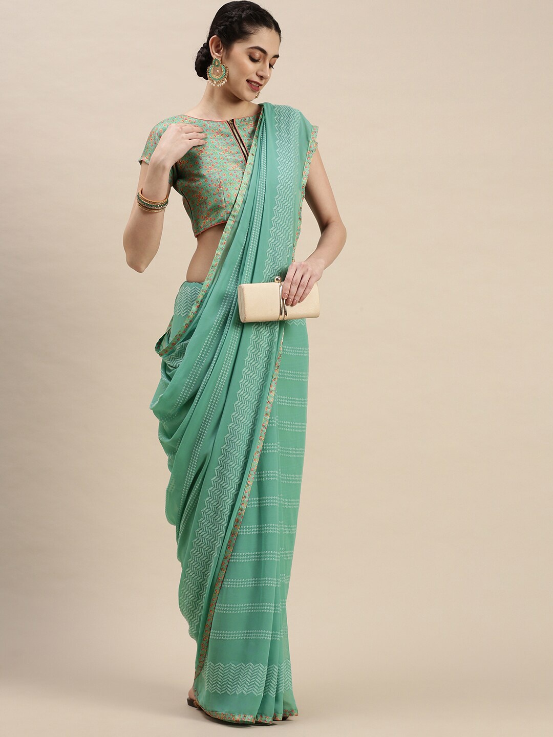 

Sunasi Embroidered Pure Georgette Saree, Turquoise blue