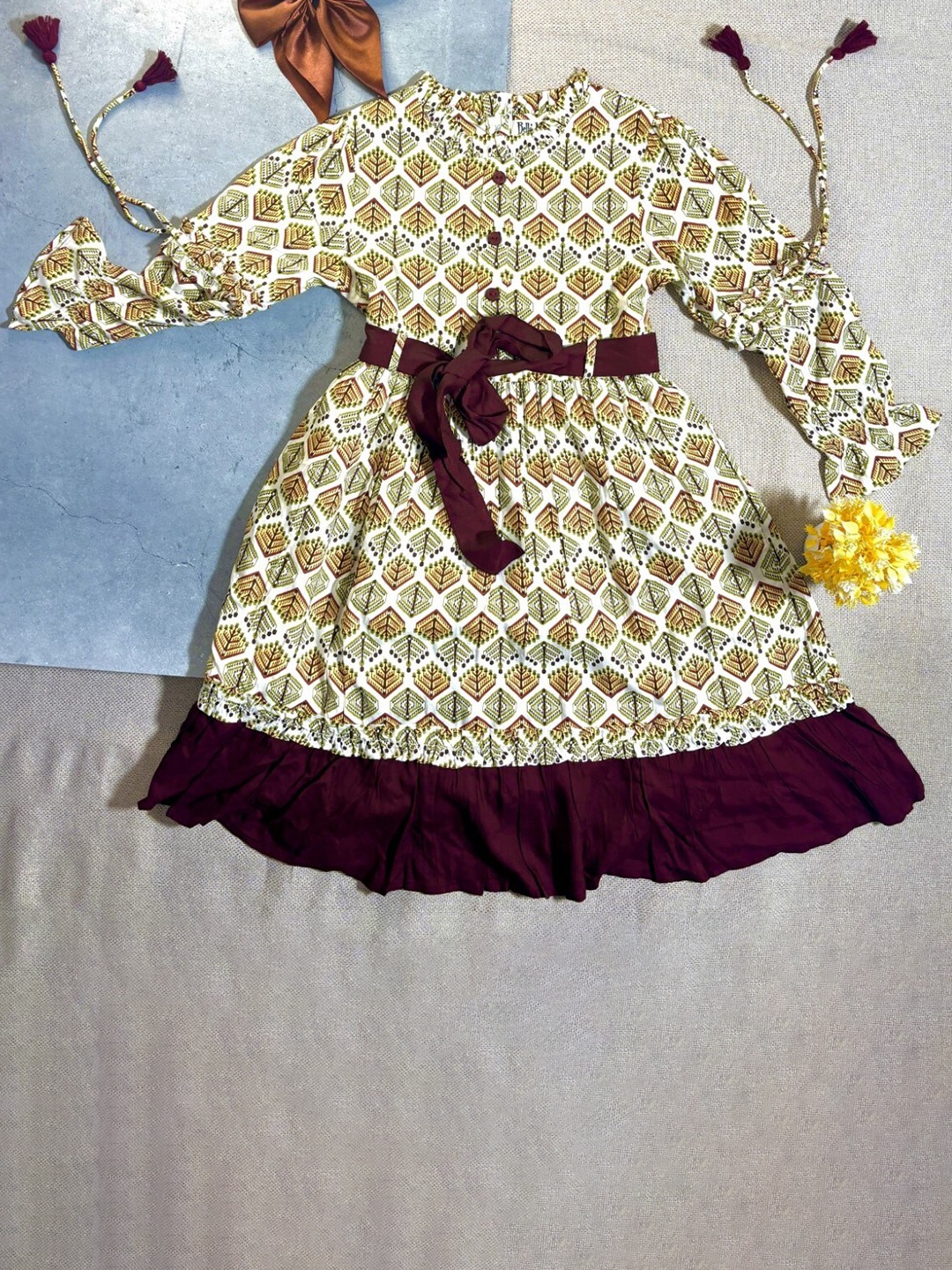 

Bella Moda Girls Ethnic Motifs Printed Tie Up Pure Cotton Fit & Flare Dress, Brown