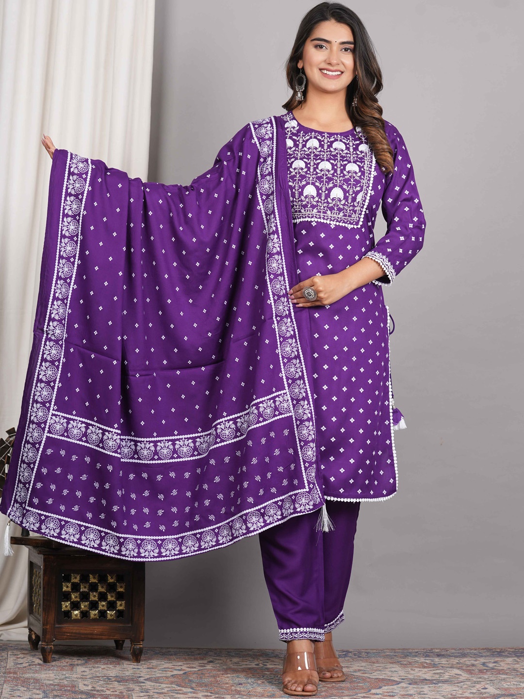 

DHANOTA Floral Printed Thread Work Straight Kurta with Trousers & With Dupatta, Purple