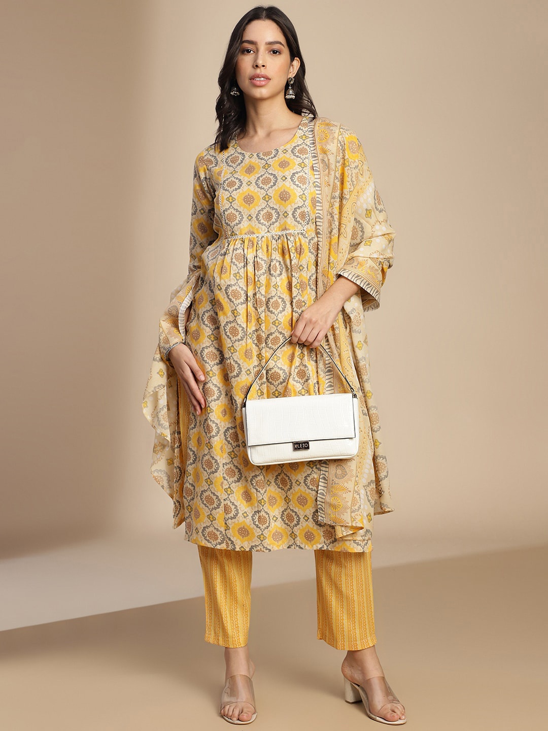 

HRITIKA Women Ethnic Motifs Printed Empire Kurta With Trousers & With Dupatta, Yellow