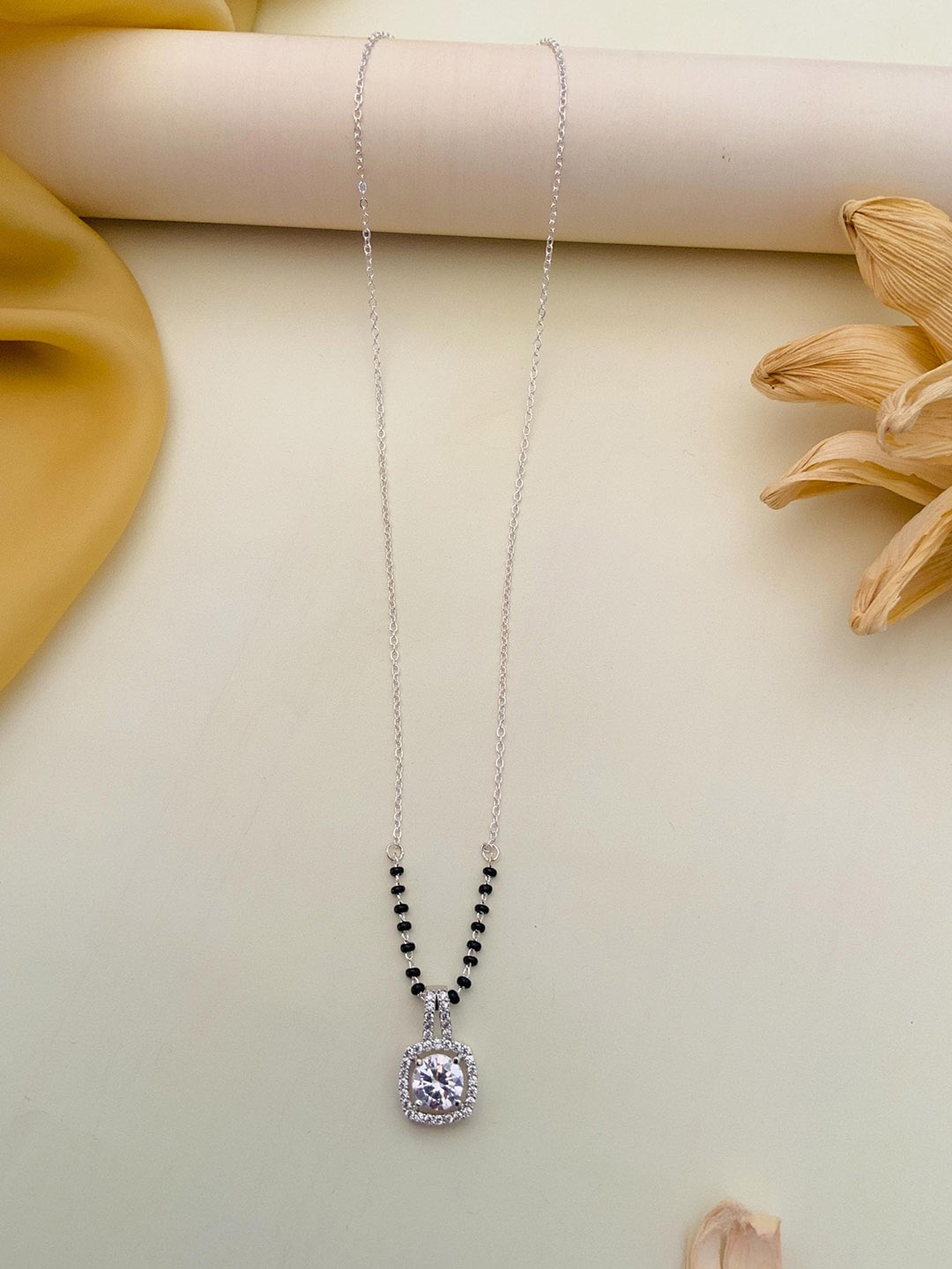 

Anouk Silver-Plated Artificial Stones and Beads Mangalsutra