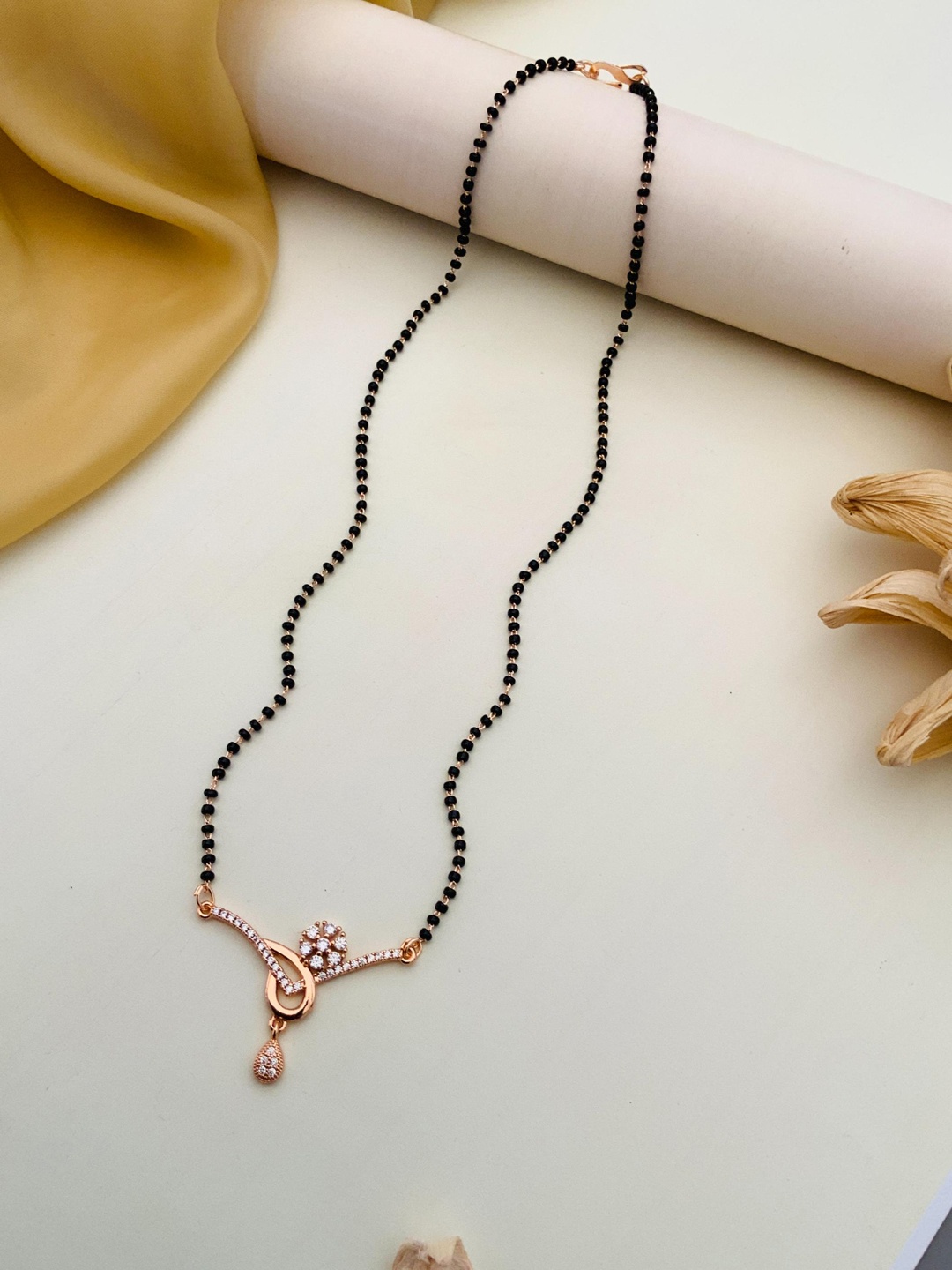 

Anouk Rose Gold-Plated Artificial Stones and Beads Mangalsutra