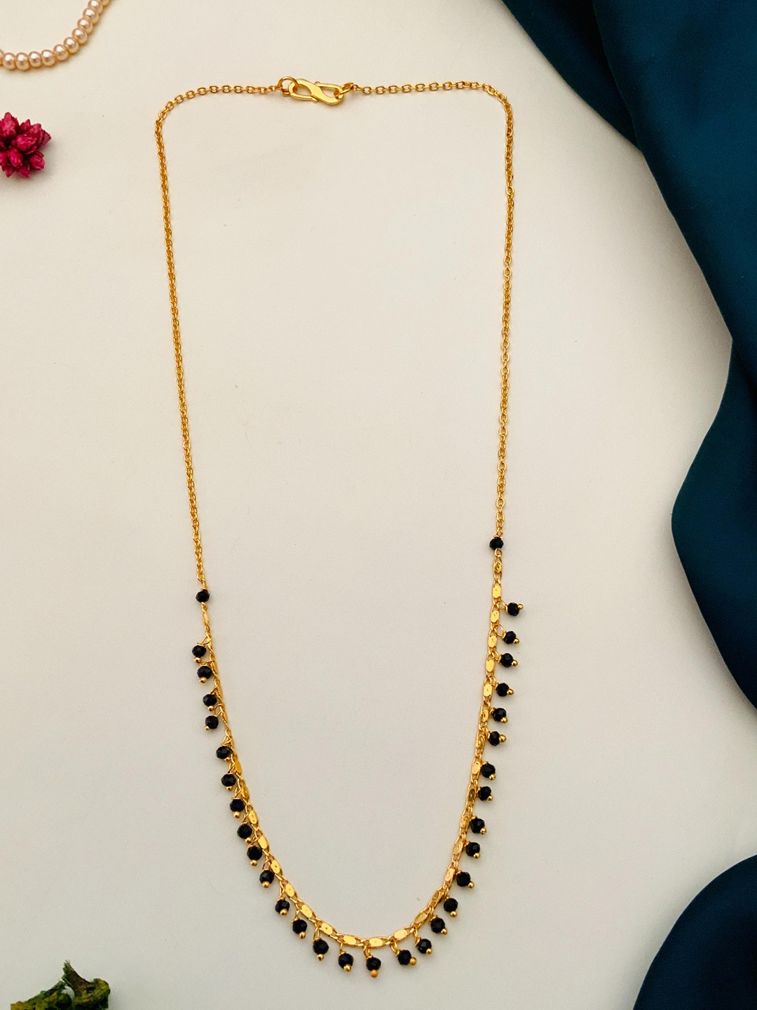 

Anouk Gold-Plated Artificial Stones and Beads Mangalsutra